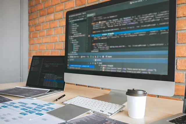 Responsive website design displayed across desktop, tablet and mobile screens